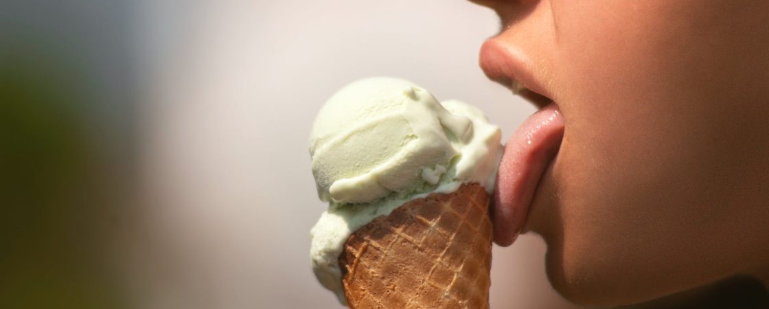 woman licking ice cream