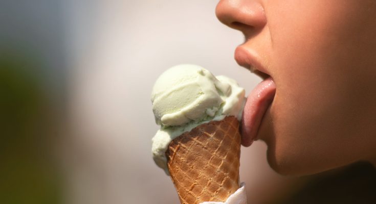 woman licking ice cream