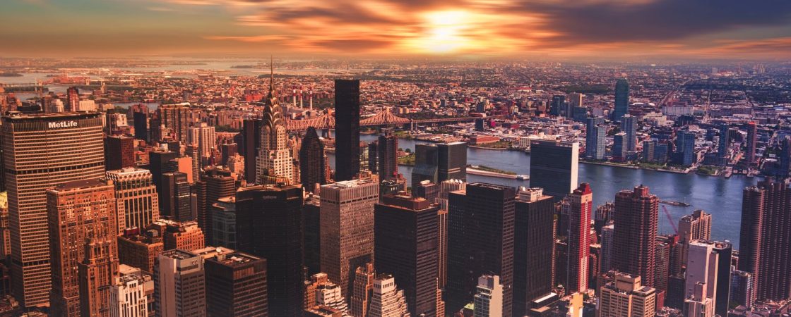 high angle view of cityscape against cloudy sky