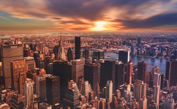 high angle view of cityscape against cloudy sky